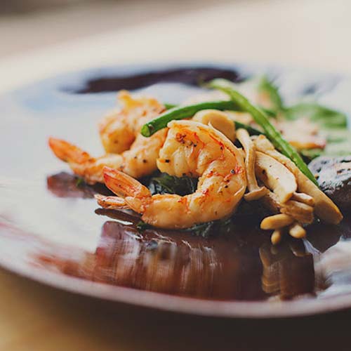 Chef Preparing Sushi Rolls